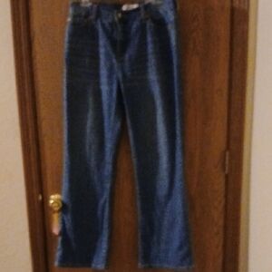 Levi's Perfectly Slimming Boot Cut Jeans Lighter Wash.